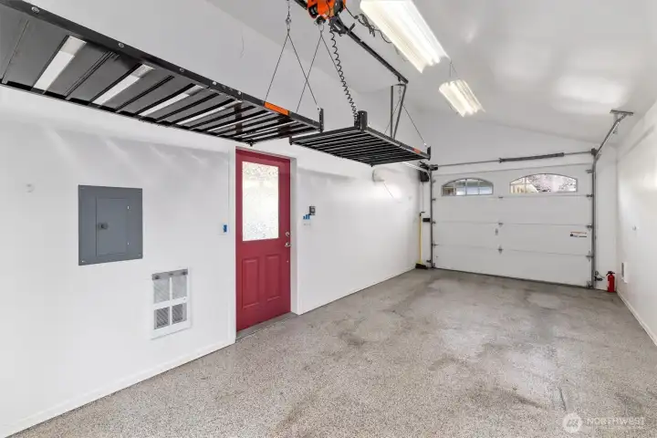 Automated storage lifts in the garage to maximize space.
