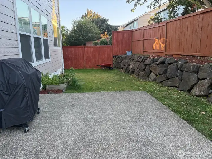 Fenced yard with patio