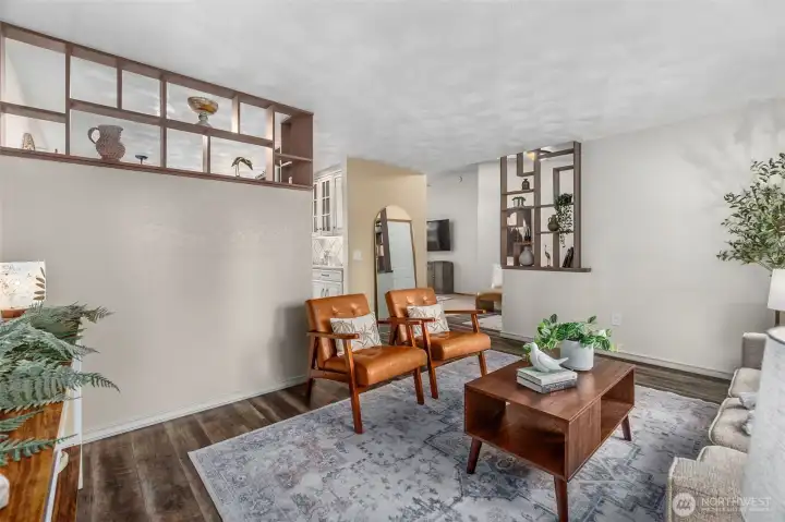 Looking throught the living room with dining & kitchen to the left .