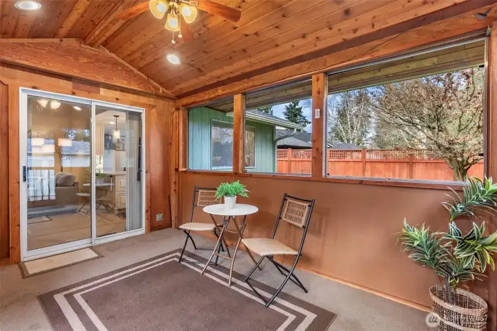 Love the knotty pine ceiling & convenient access to the kitchen! The ceiling fan keeps air circulating on warmer days & A/C keeps the home comfortable & cool when you need it most!