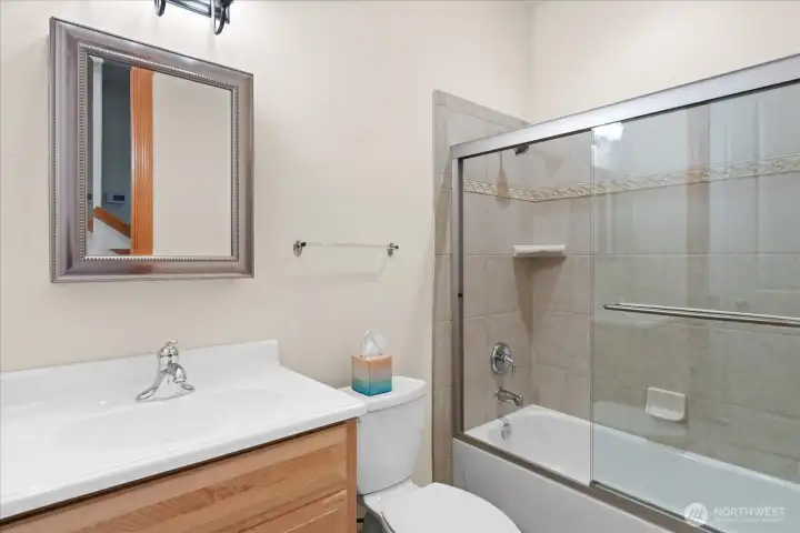 Lower floor full bath right next to media room