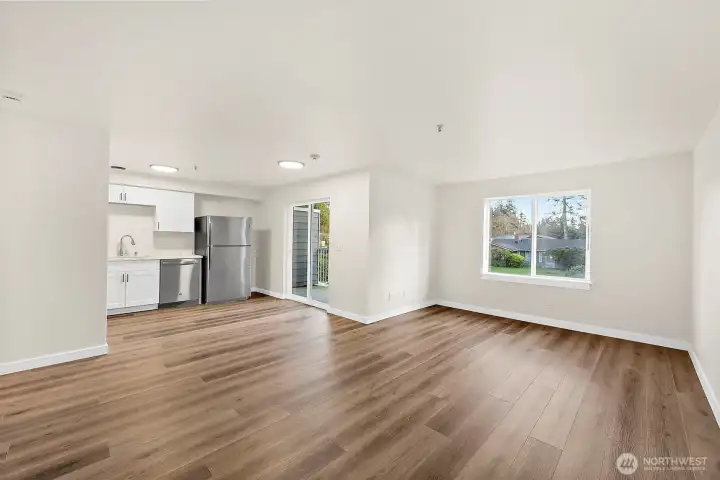 Living Area, New Sliding Glass Door Accesses Private Balcony!