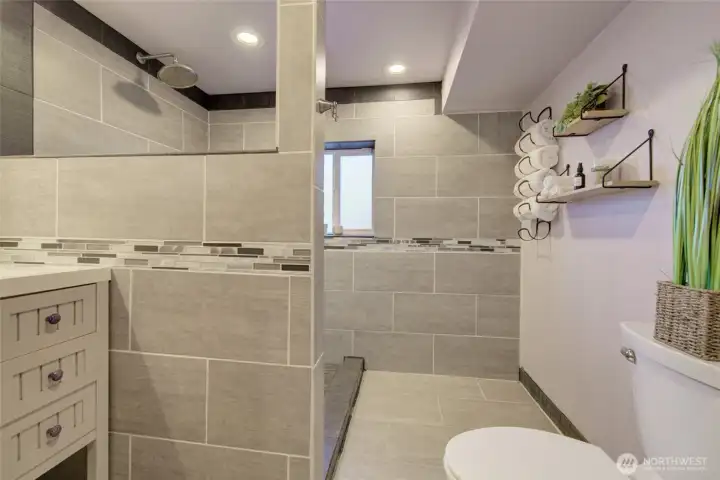 Owner's Suite Bathroom with custom tile and updated features
