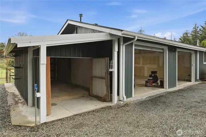 Left side of house with woodshed and garage.