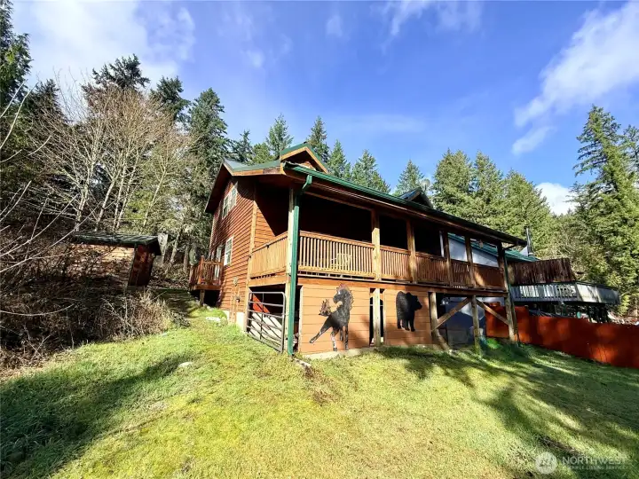 Back of the home, which overlooks a pond.