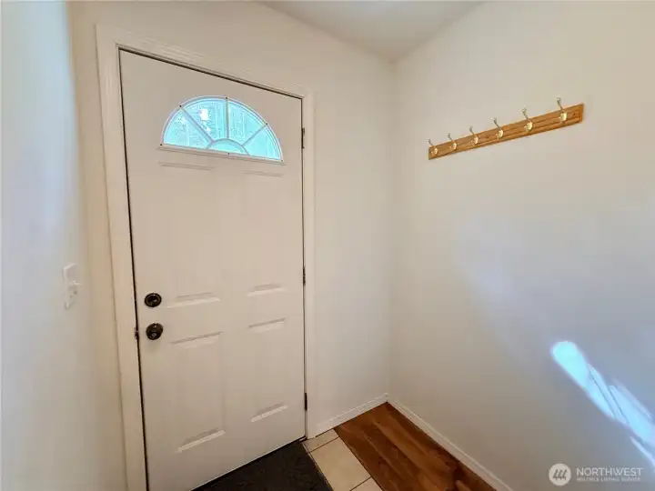 "Hallway" side exterior door by the bedroom and utility room and main bathroom.