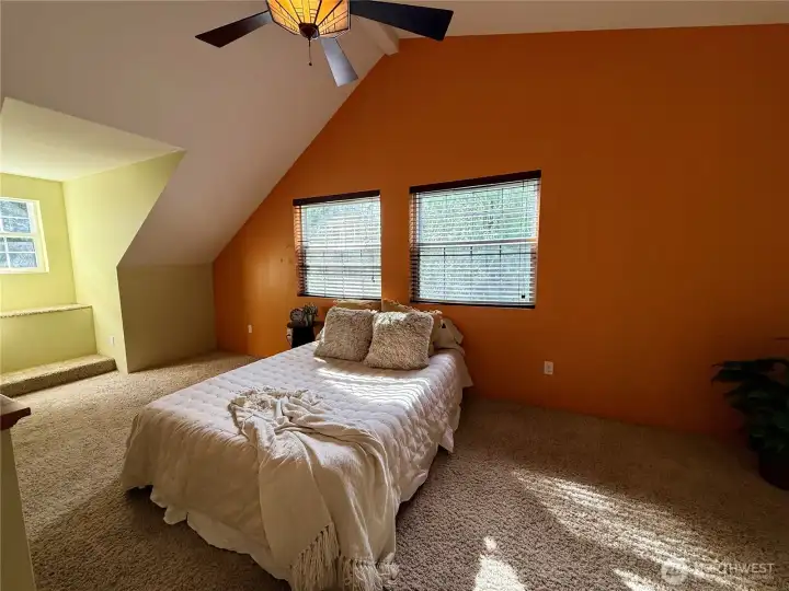 Primary loft-styled bedroom.
