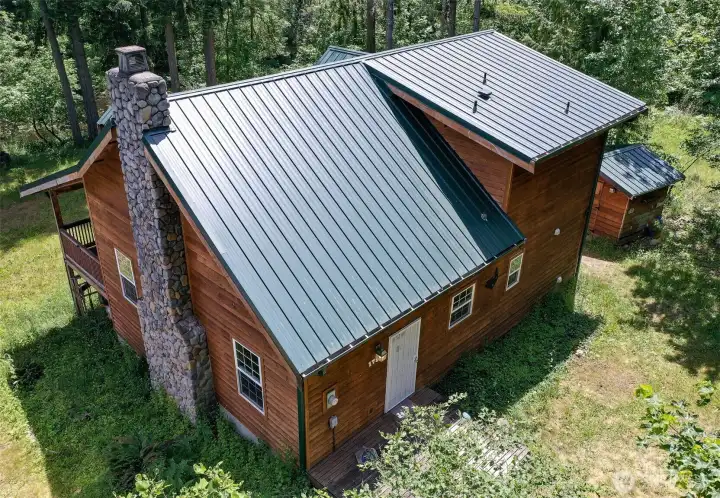 (2023) Aeriel photo of the front of the home.