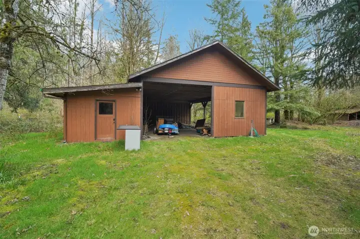 Well-maintained barn supporting equestrian use and equipment storage