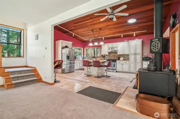 Open living area with wood ceiling detail