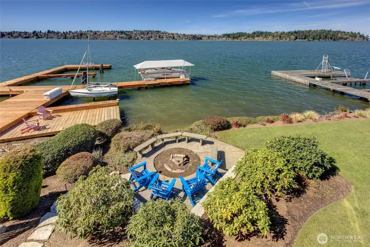 95 Feet of private waterfront, plus a 1/8 interest in community waterfront.  Private lakeside deck, and 2 moorage slips.