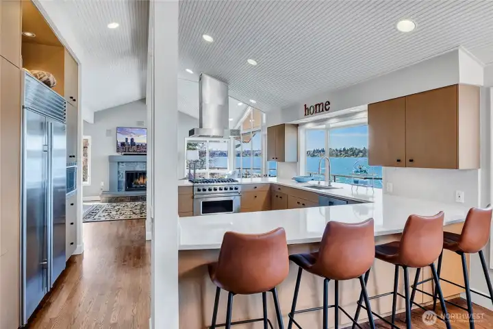 The kitchen is beautifully positioned at the heart of the home, seamlessly open to both the living and family rooms, creating a natural, circular flow that is ideal for entertaining.