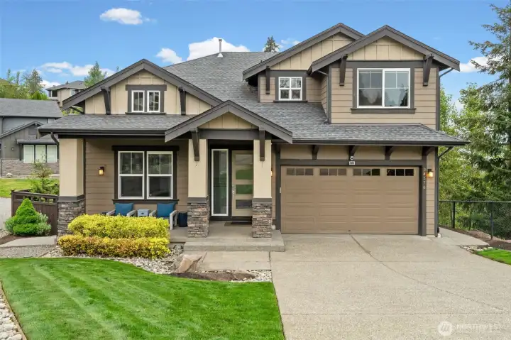Exceptional Craftsman curb appeal welcomes you home. Stone accents, a covered front porch, and a 2-car garage set the tone for the quality and care found throughout this stunning West Hill property