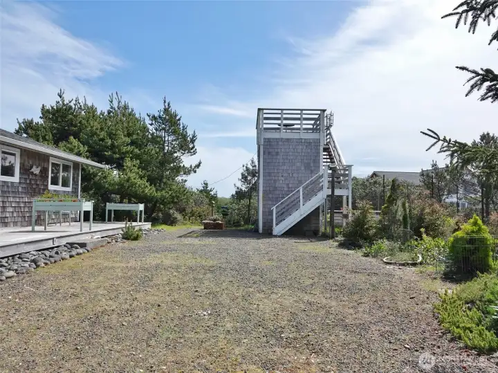 Large Driveway with a Shed and Viewing Tower.
