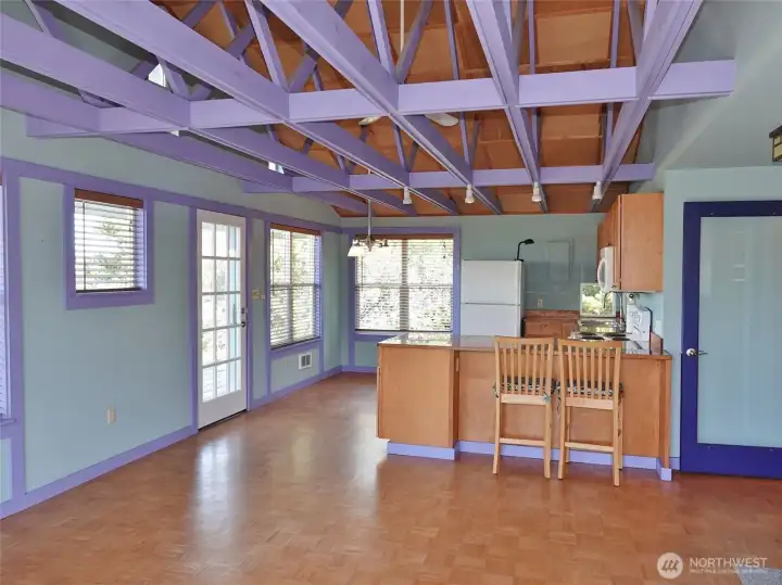 Unique designer-style Great Room w/ open beams and vaulted ceilings.