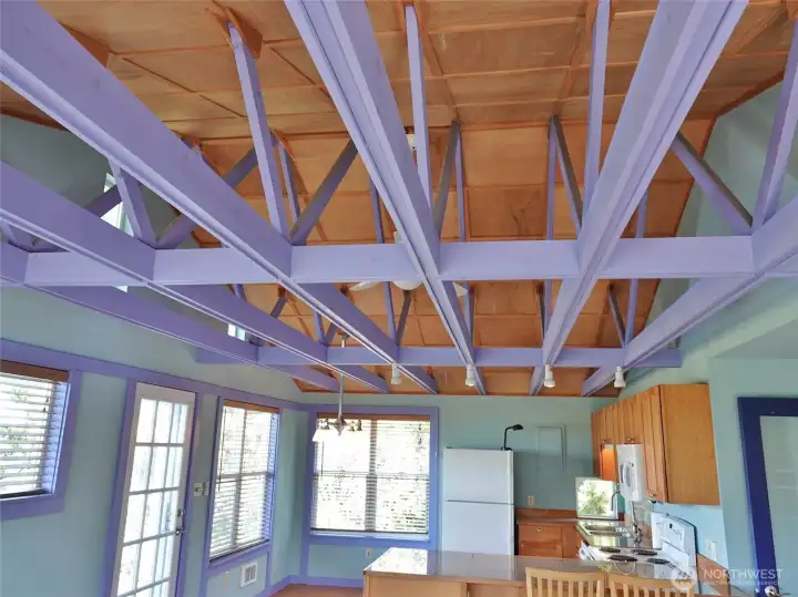 Vaulted ceilings and open beams.