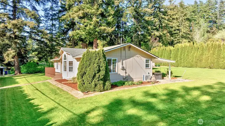 Nearly half an acre on a gently sloped lot.