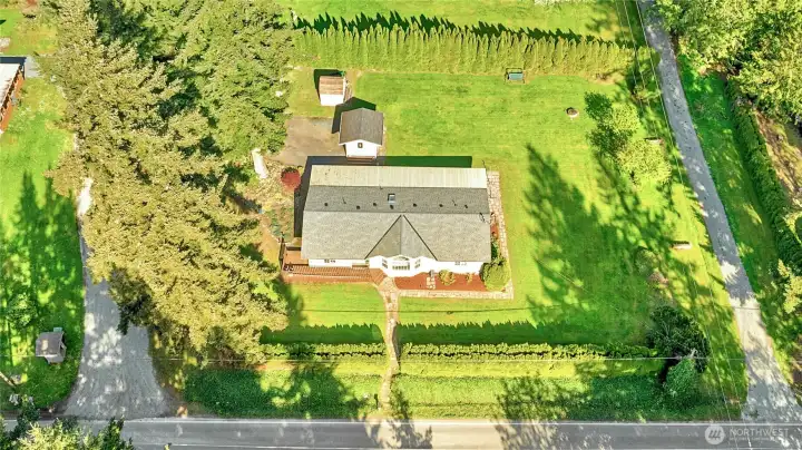 Nearly half an acre on a gently sloped lot.