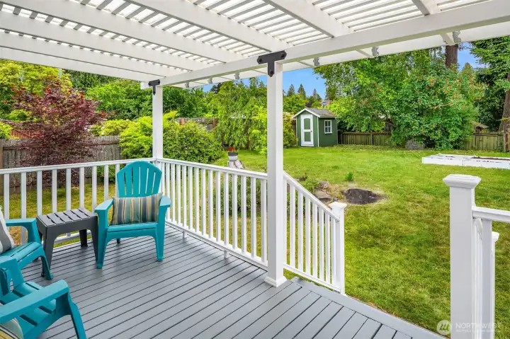 Covered deck offers the perfect retreat, providing essential shade during hot summer days and protection from the classic Seattle drizzle. Covered deck offers the perfect retreat, providing essential shade during hot summer days and protection from the classic Seattle drizzle.