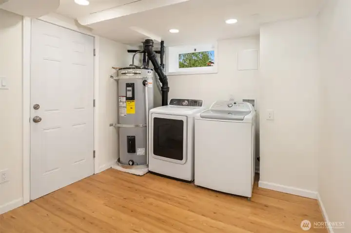 Laundry, mechanical, & access to the garage. Laundry, mechanical, & access to the garage.
