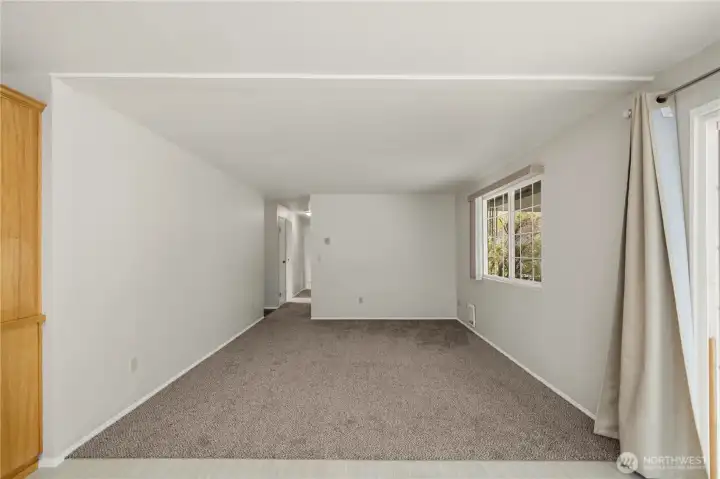 Family Room has all new carpet and looks out over the backyard Family Room has all new carpet and looks out over the backyard