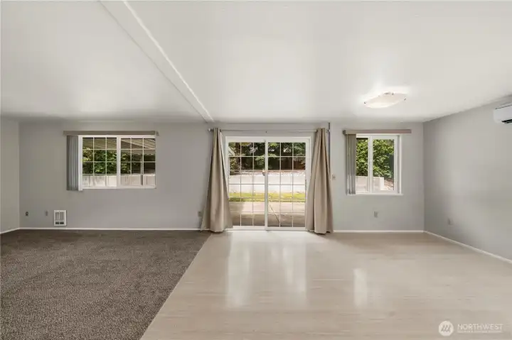 The family and dining rooms offer easy access to the covered outdoor patio The family and dining rooms offer easy access to the covered outdoor patio