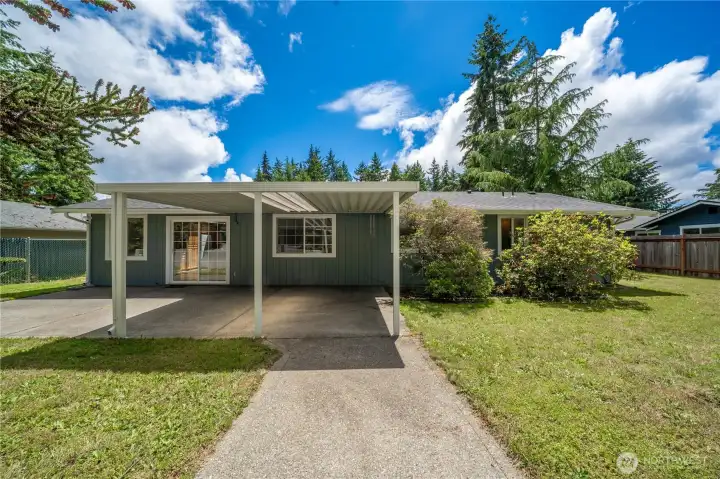 Huge patio runs 1/2 the length of the house. Huge patio runs 1/2 the length of the house.