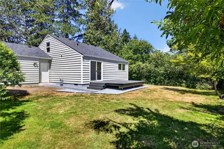 Fenced back yard and new deck.