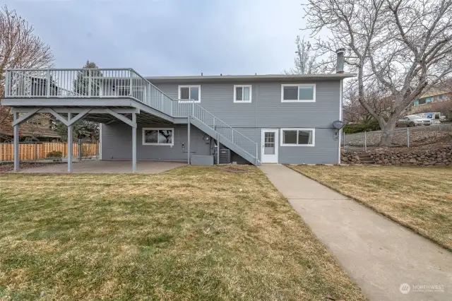 Spacious upper level deck and lower level patio for enjoying the private backyard!