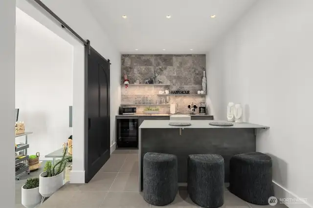 The lower-level kitchen ensures effortless entertaining.