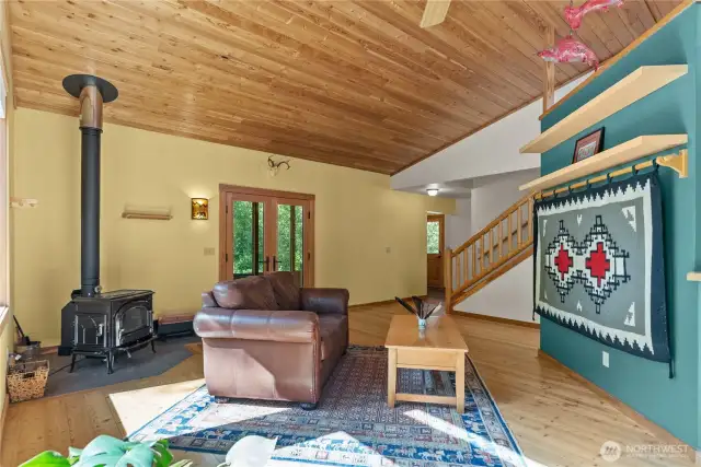 Open layout connecting kitchen, dining, and living room.