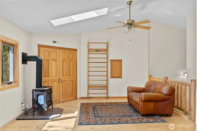 Bonus loft room offers flexibility for home office, studio, or fourth bedroom.