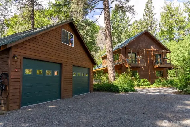 Charming cedar-sided home nestled in mature forest—secluded and serene.