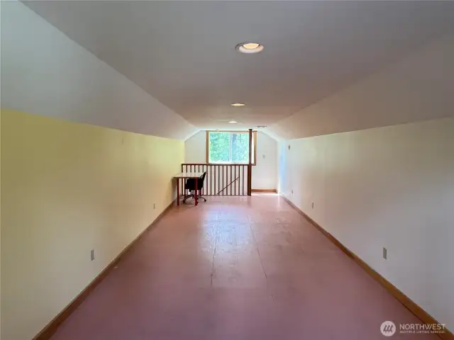 Detached 2-car garage with workshop, kitchenette, and upper studio.