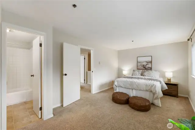 There is a door from the primary bedroom into the shared bathroom for easy access.