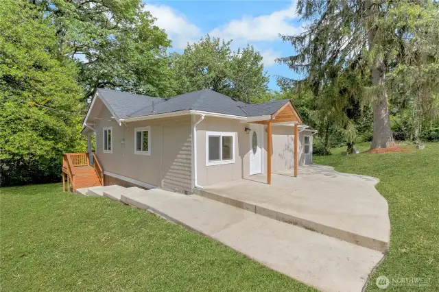 The grass was photoshopped to give you a better idea of how the yard could look with healthy, green grass
