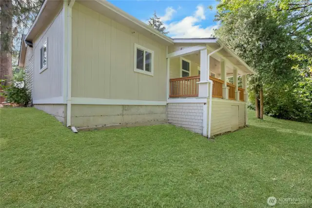 The grass was photoshopped to give you a better idea of how the yard could look with healthy, green grass