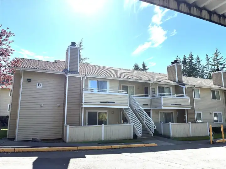 Ground floor corner unit with no steps and has fenced patio with storage.