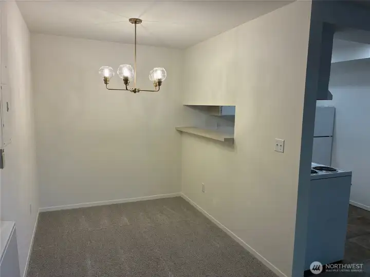 Spacious dining room with pass through to the kitchen.