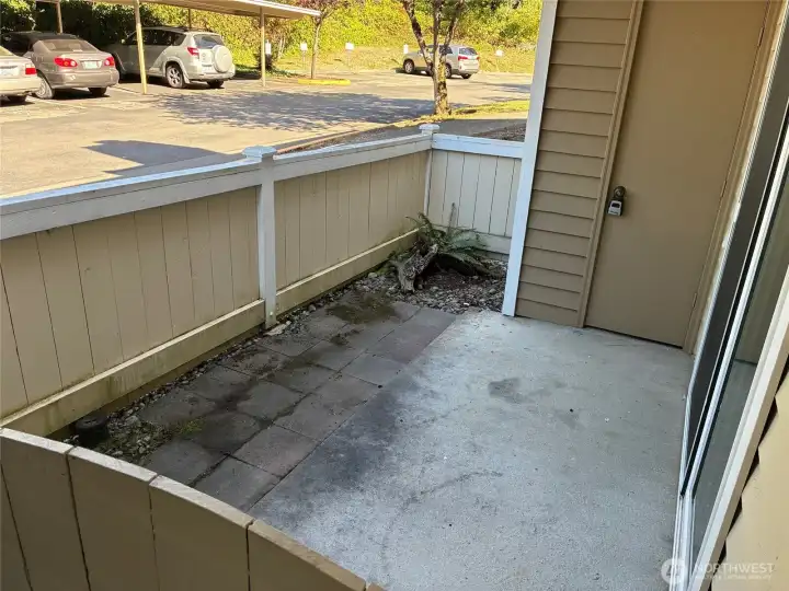 Fenced patio with storage