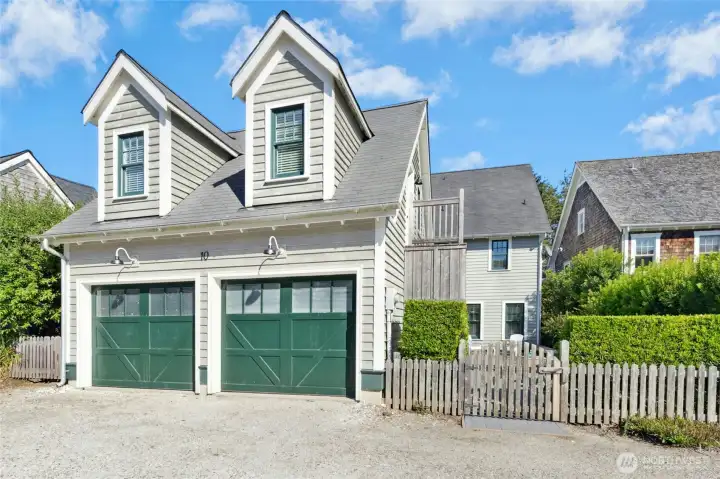 The two-car garage includes an EV charger, keeping your electric vehicle ready for the road ahead.