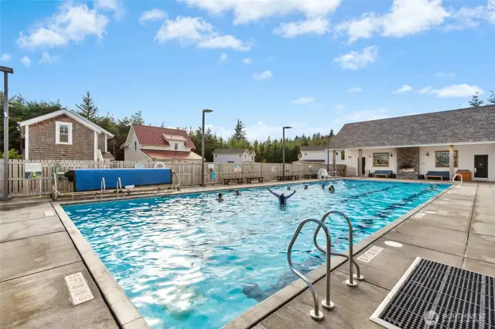 Enjoy year-round access to Seabrook's Sunrise Pool, a heated saltwater retreat perfect for swimming, lounging, and soaking up the coastal sunshine.