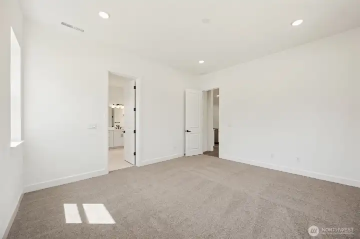 Primary Suite  *This photo is of another home. Features and finishes may vary.