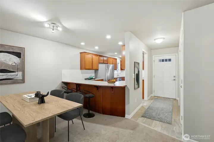 Ideal spot for weeknight dinners or hosting friends.  [Virtually staged photo]