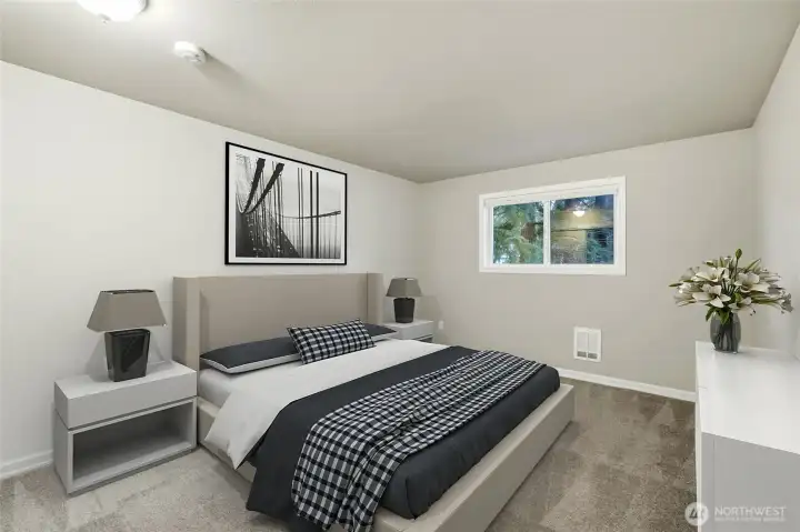 Oversized primary bedroom with space for king-sized furniture and more.  [Virtually staged photo]