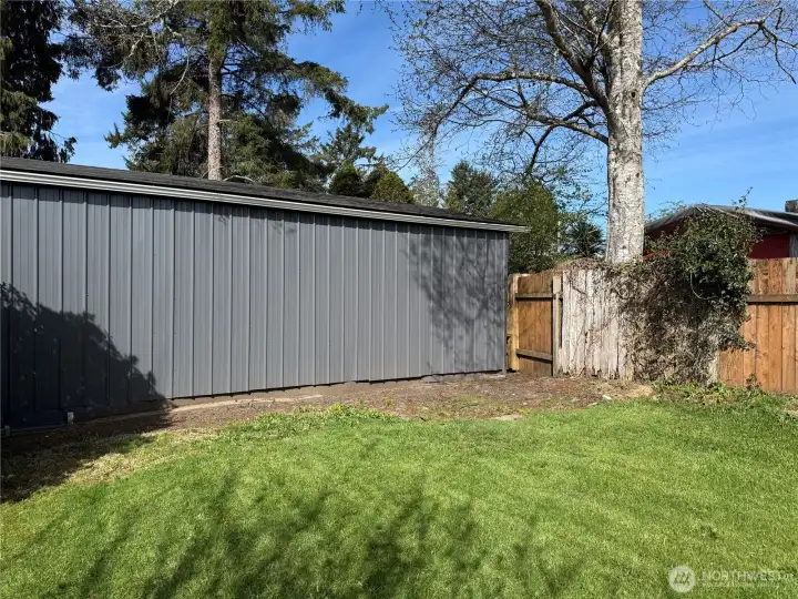 Facing northwest in back yard.