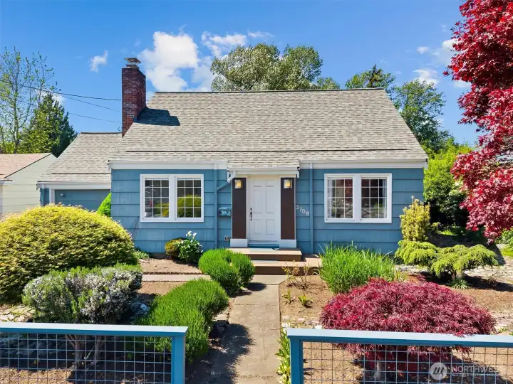 Welcome to this charming Columbia home with classic architecture, mature landscaping, and a welcoming front entry.