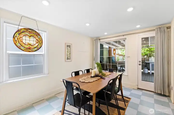 Dining area with vintage charm and seamless access to the covered outdoor entertaining space.