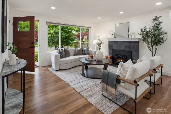 The spacious living room features wonderful versatility for a variety of furniture arrangements.