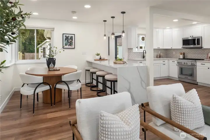 The great room concept provides amazing sight lines from the living room all the way to the designer kitchen.